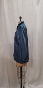 Coupe-vent bleu luisant