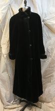 Manteau long fausse fourrure noir