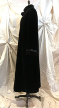 Manteau long fausse fourrure noir