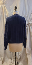 Pull torsadé Col V