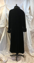 Manteau long fausse fourrure noir