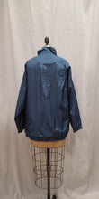 Coupe-vent bleu luisant