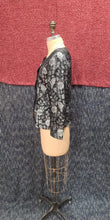 Veston court jacquard noir et argent