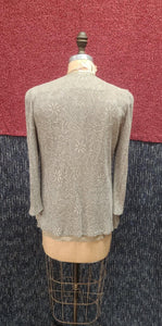 Veste crochetée dorée