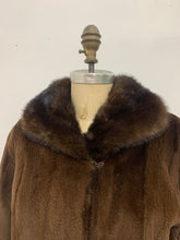 Manteau de fourrure mi-long