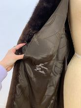 Manteau de fourrure mi-long