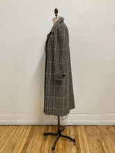 Manteau de laine carreauté noir et blanc