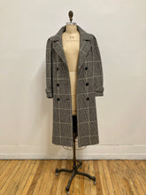 Manteau de laine carreauté noir et blanc