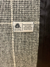 Manteau de laine carreauté noir et blanc