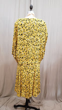 Chandail jaune à motifs géométrique