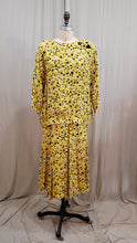 Chandail jaune à motifs géométrique