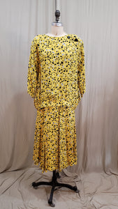 Chandail jaune à motifs géométrique