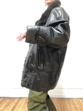Manteau mi-long en cuir et fourrure