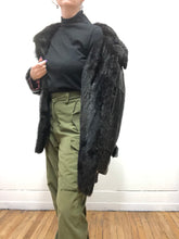Manteau mi-long en cuir et fourrure
