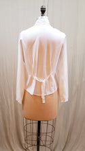 Blouse blanche à col cheminée