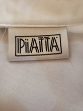 Blouse blanche à col cheminée