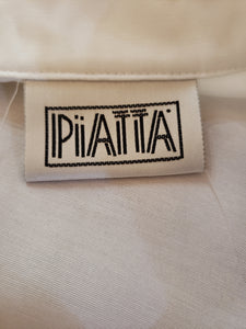 Blouse blanche à col cheminée