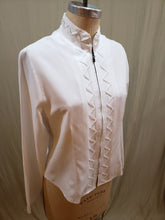 Blouse blanche à col cheminée