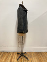 Manteau de cuir et fourrure