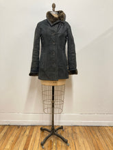 Manteau de cuir et fourrure