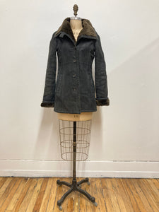 Manteau de cuir et fourrure