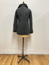 Manteau de cuir et fourrure