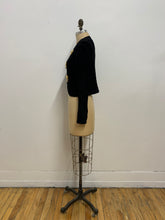 Veste de laine ornements lion d'or