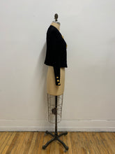 Veste de laine ornements lion d'or