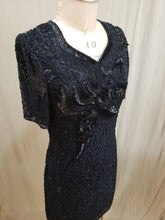 Robe de soie perlée vintage