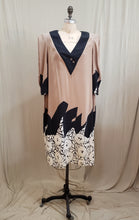 Robe tunique à motifs de fleurs abstraits