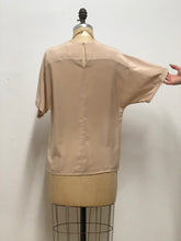 Chandail beige soyeux